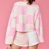 CHECKING THINGS OUT PINK KNIT TOP