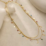 SORAYA LAYERED STAR AND MOON CHARM NECKLACE