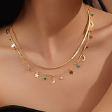 SORAYA LAYERED STAR AND MOON CHARM NECKLACE